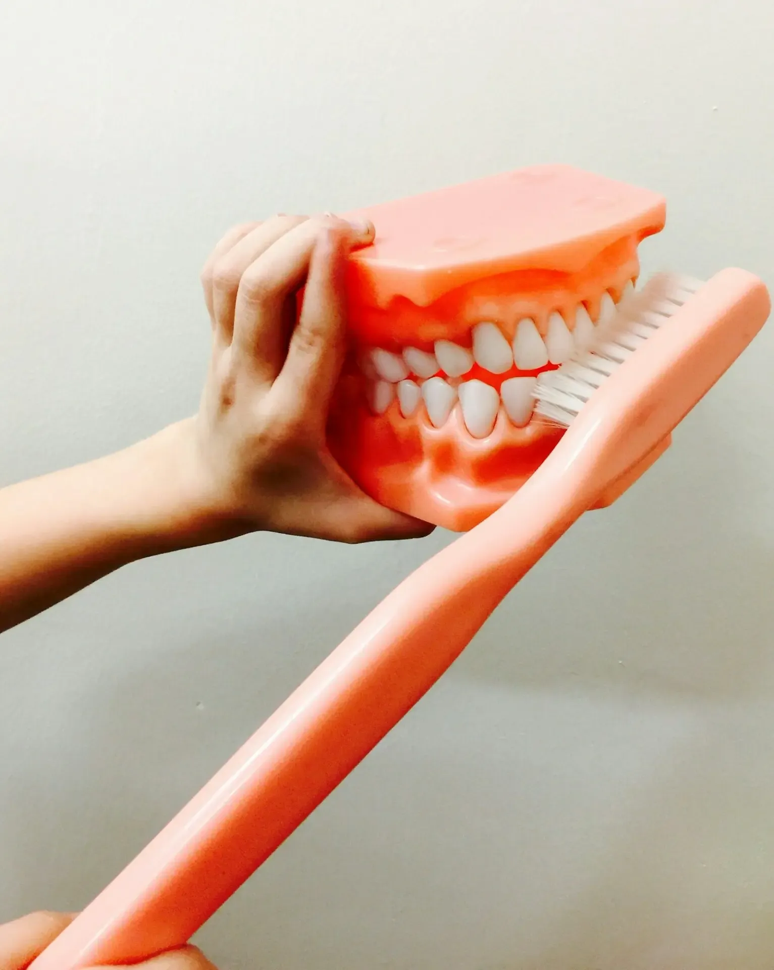 A person brushing their teeth