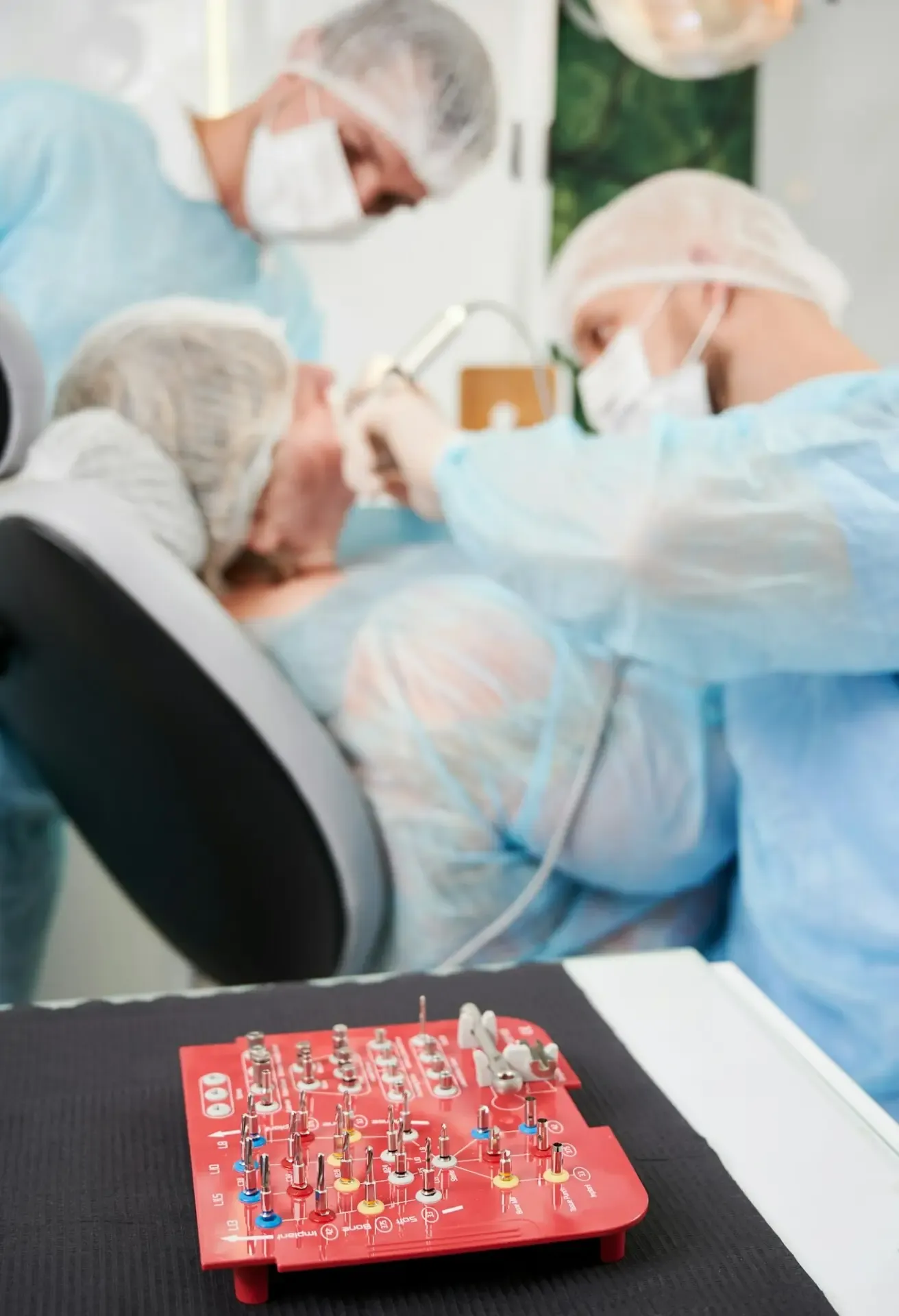 A dental implant kit on a table in a dental office