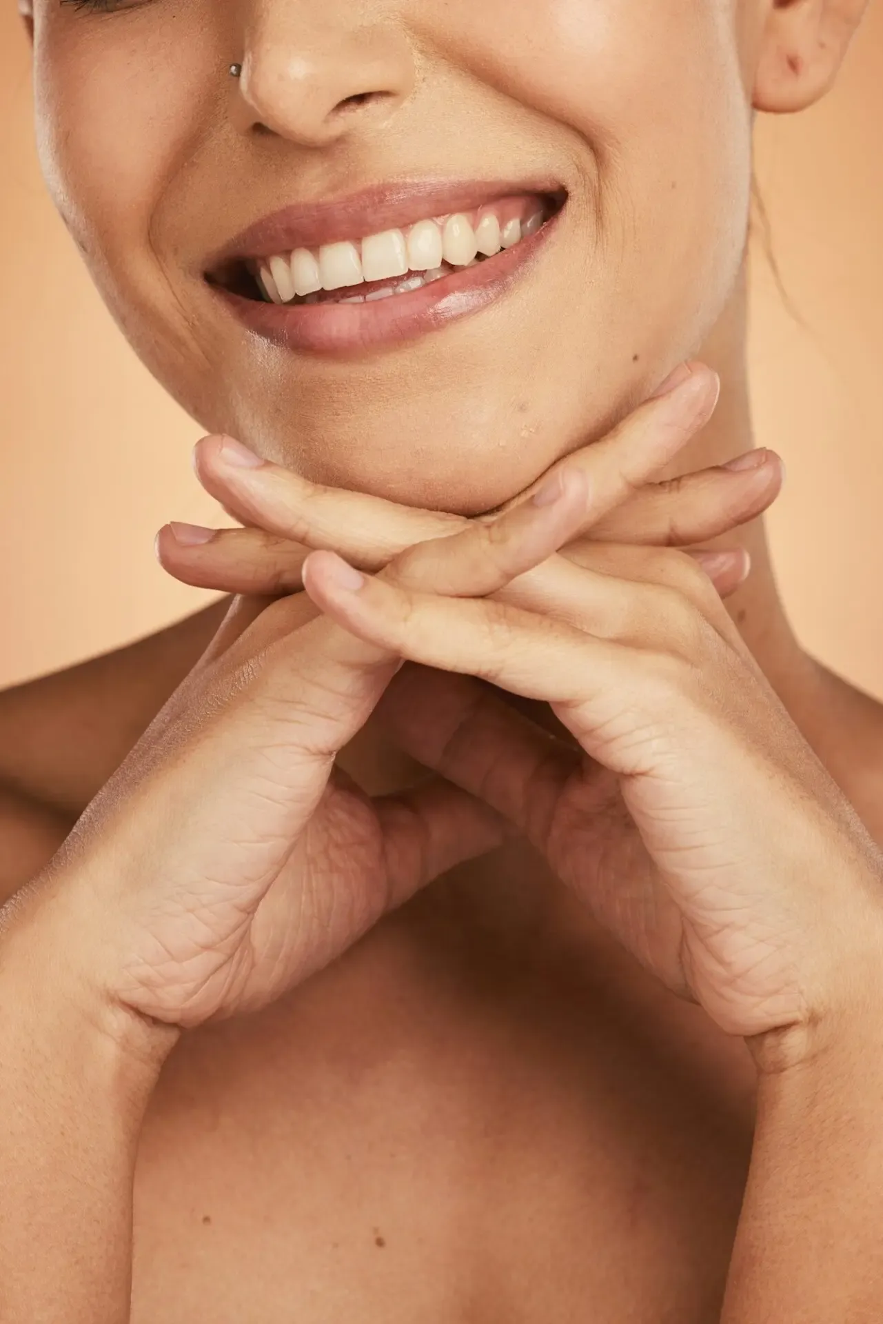 A close-up of a woman's healthy smile