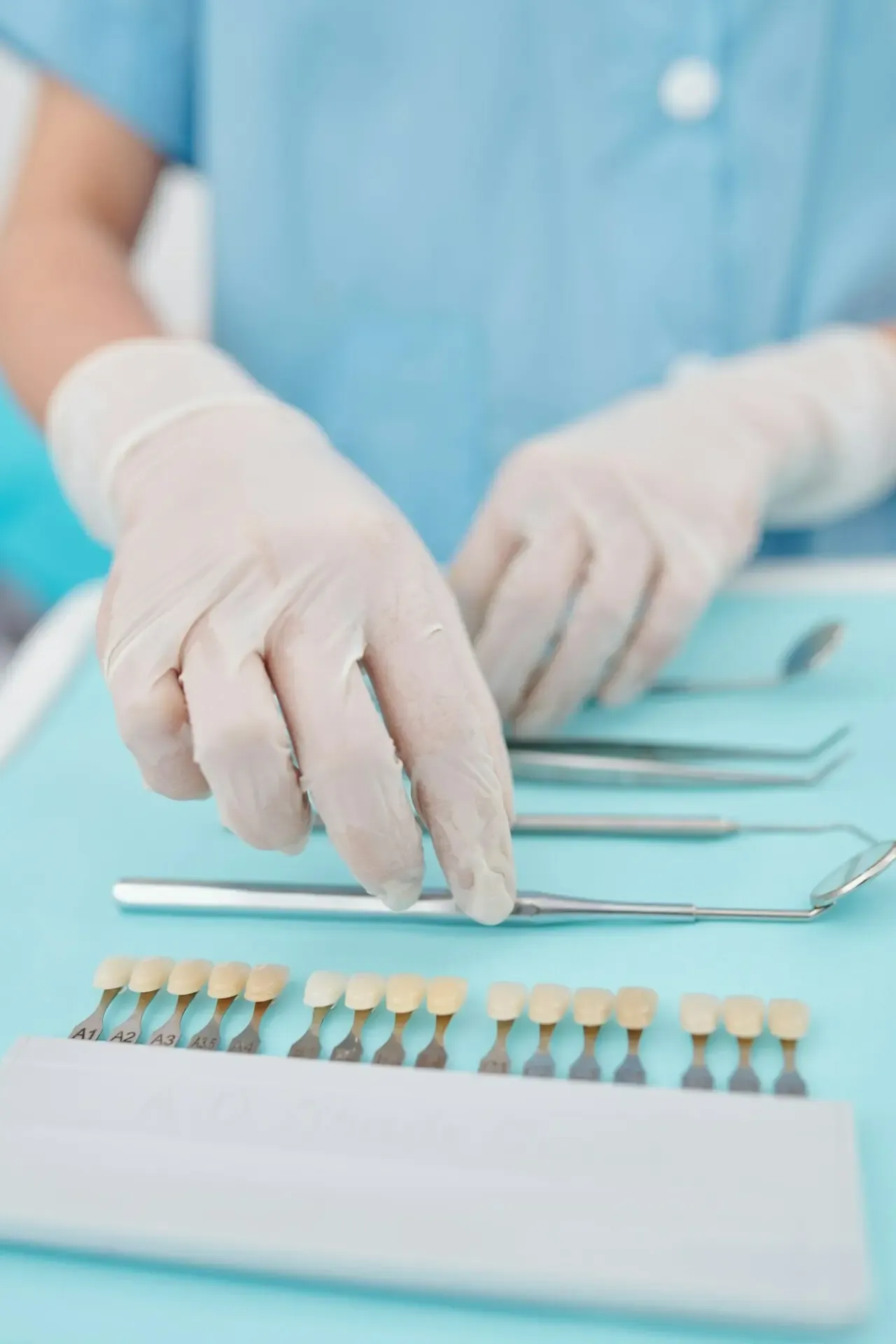 Disinfected dentist tools and a veneers color palette
