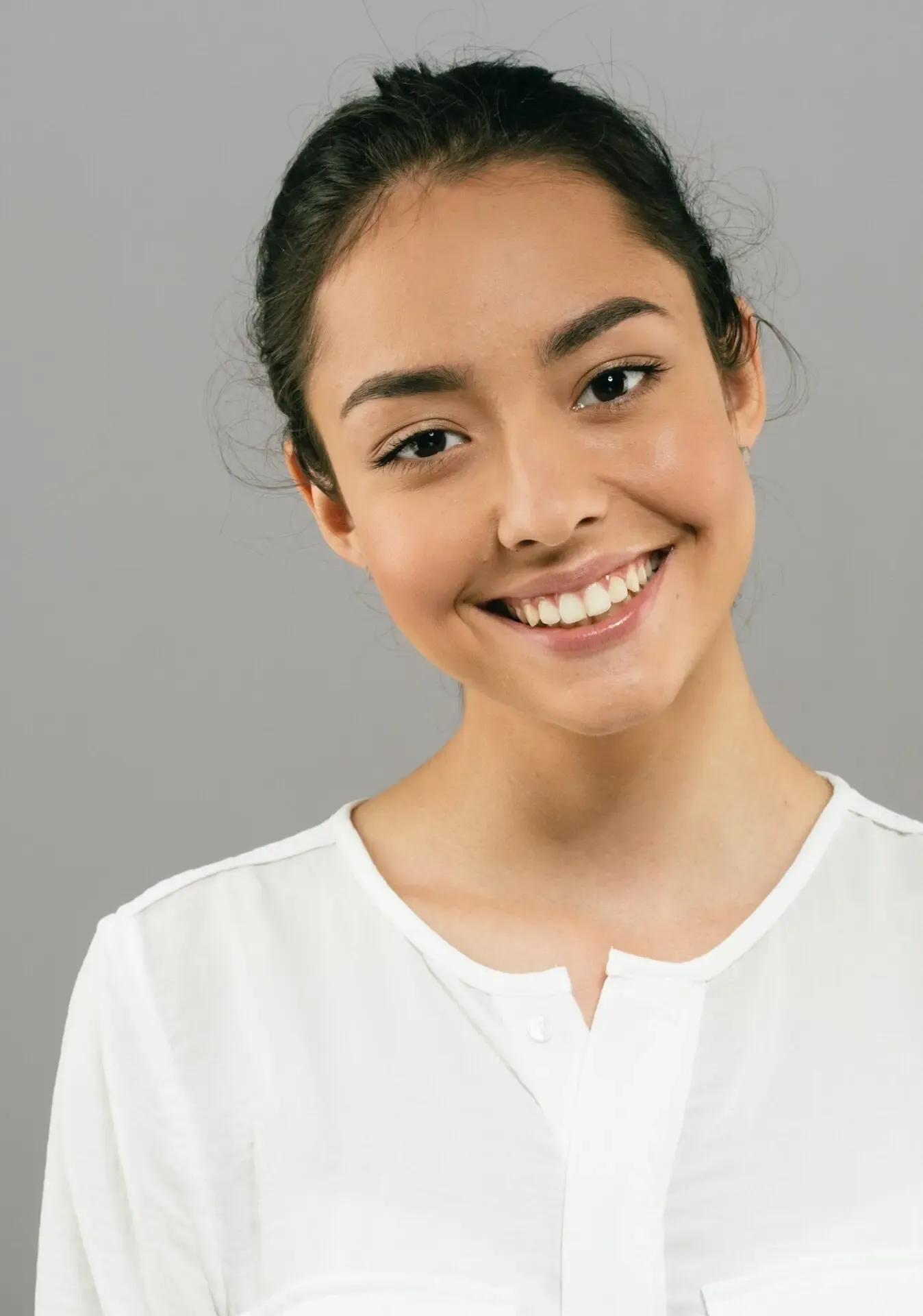 A woman with healthy teeth and a beautiful smile