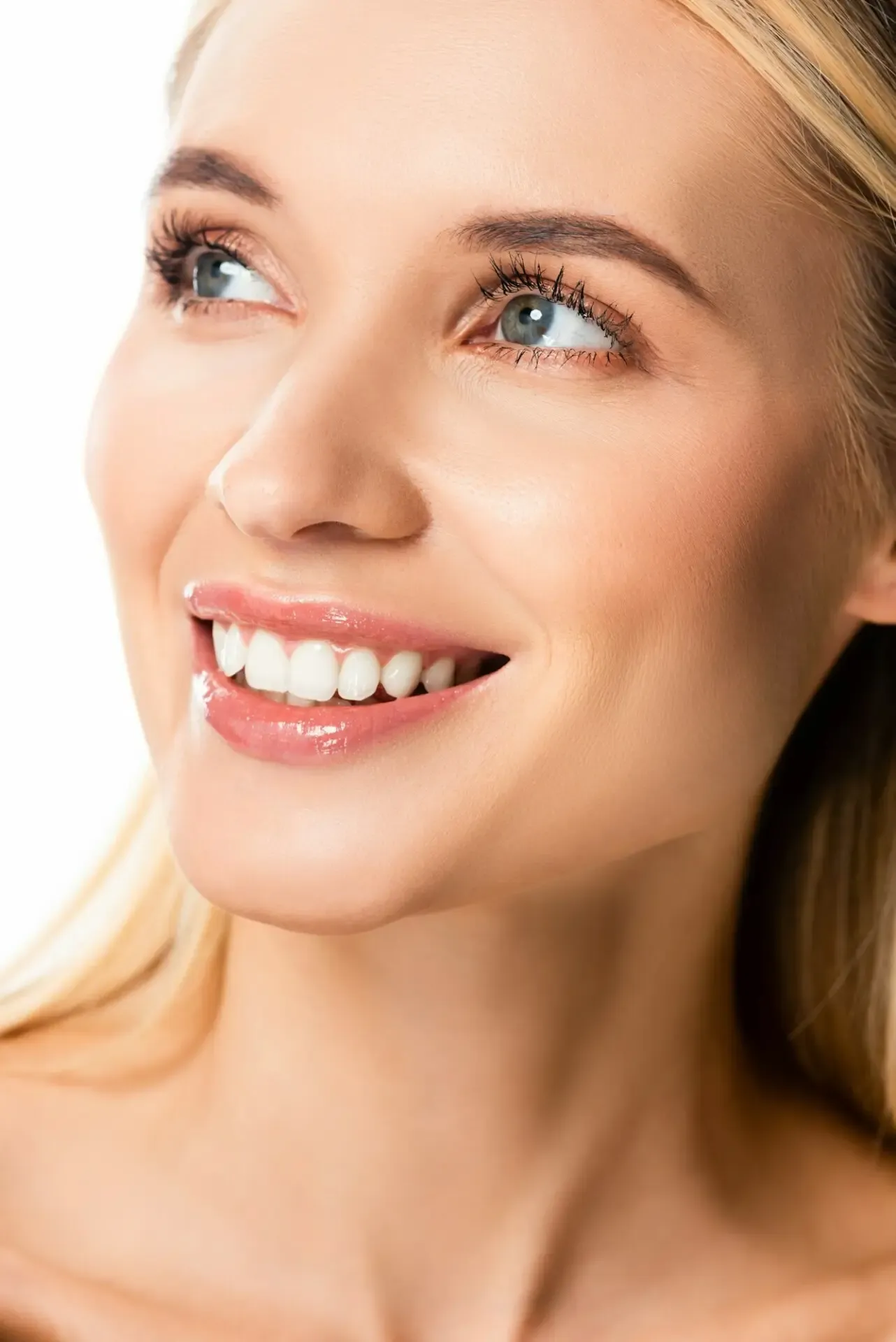 A smiling woman with bright white teeth